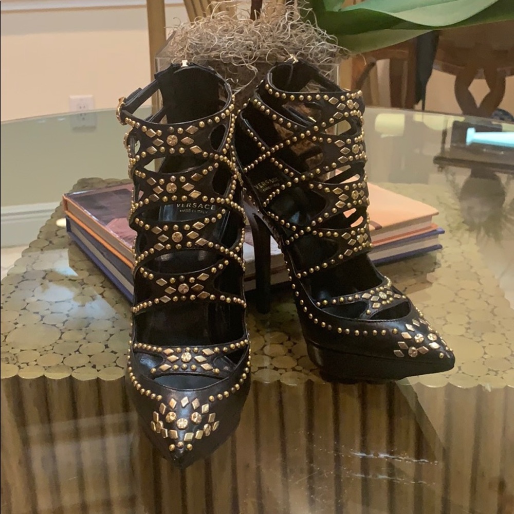 Versace black booties with gold accents